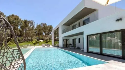 New-build villa with beautiful garden and partial sea views in Sol de Mallorca