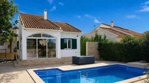 Detached single-family home with a large pool, beautiful garden, and self-contained guest apartment