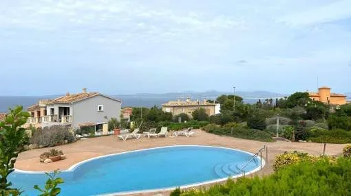Two bedroom townhouse in residential complex with sea views.