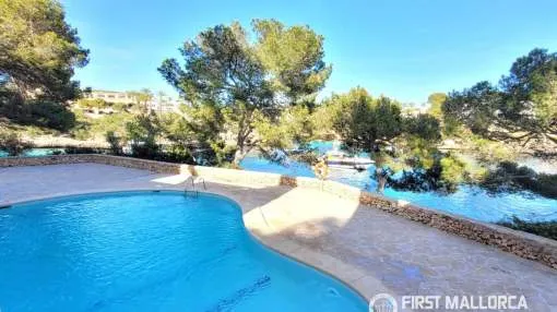 Modern apartment in a residential community with pool and direct access to the sea