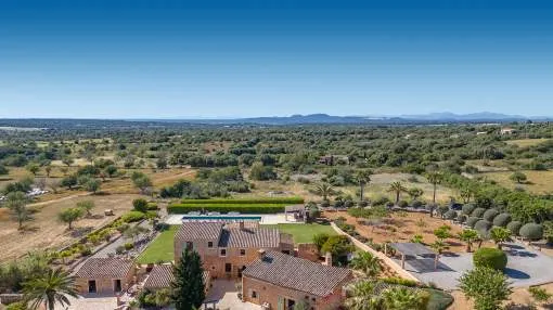 Exclusive natural stone finca with rental license and sea views to Cabrera in prime location of Santanyí